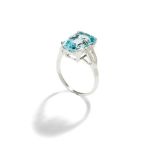 An aquamarine and diamond ring