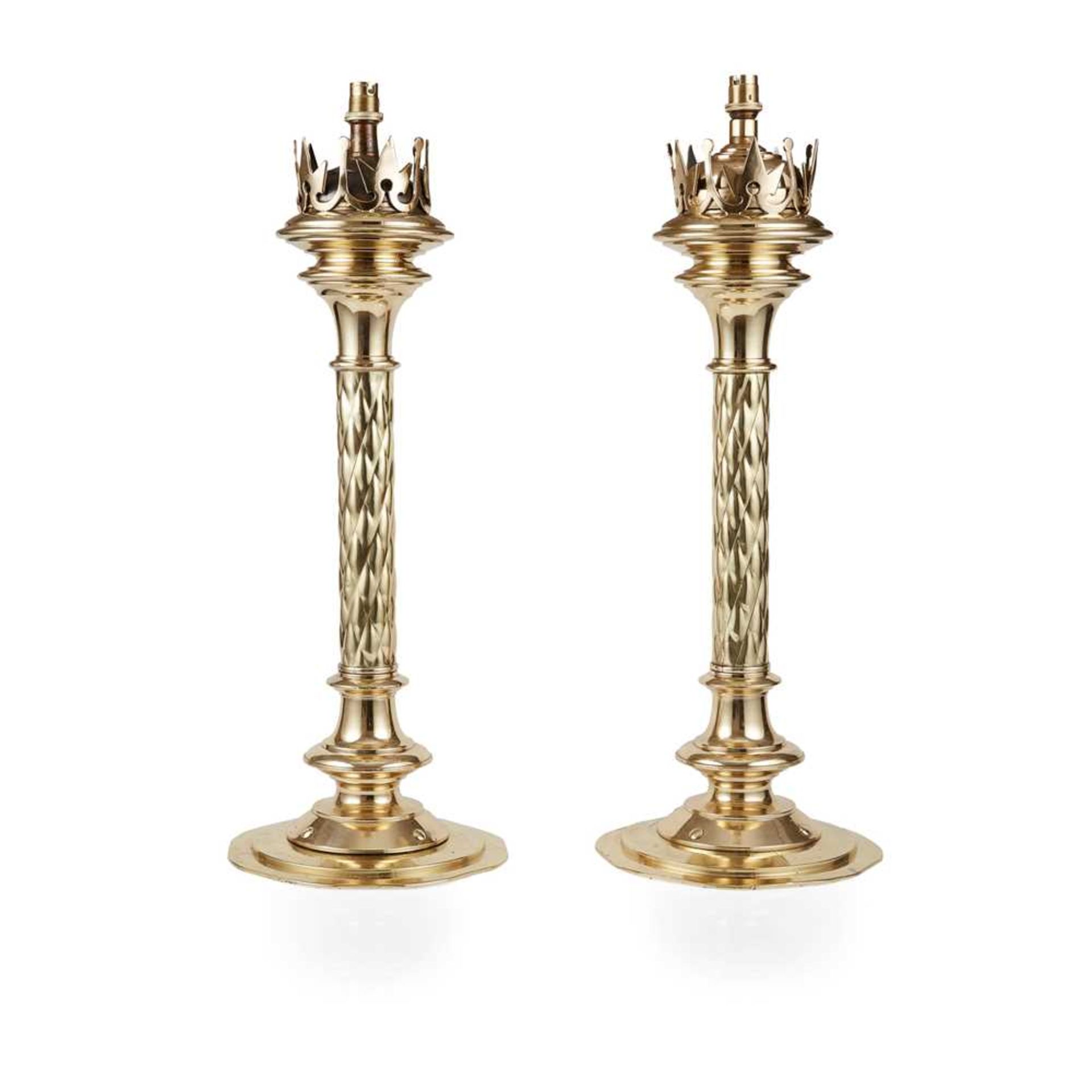 MANNER OF HARDMAN & CO. PAIR OF GOTHIC REVIVAL NEWEL CANDLESTICKS, CIRCA 1890