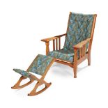 MANNER OF LIBERTY & CO., LONDON ARTS & CRAFTS RECLINING ARMCHAIR, AND ASSOCIATED STOOL, CIRCA 1910