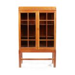 ARTHUR ROMNEY GREEN (1872-1945) ARTS & CRAFTS BOOKCASE, CIRCA 1925