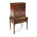 ARTHUR W. SIMPSON (1857-1922), KENDAL (ATTRIBUTED MAKER) ARTS & CRAFTS TWO-DOOR CABINET ON STAND, CI