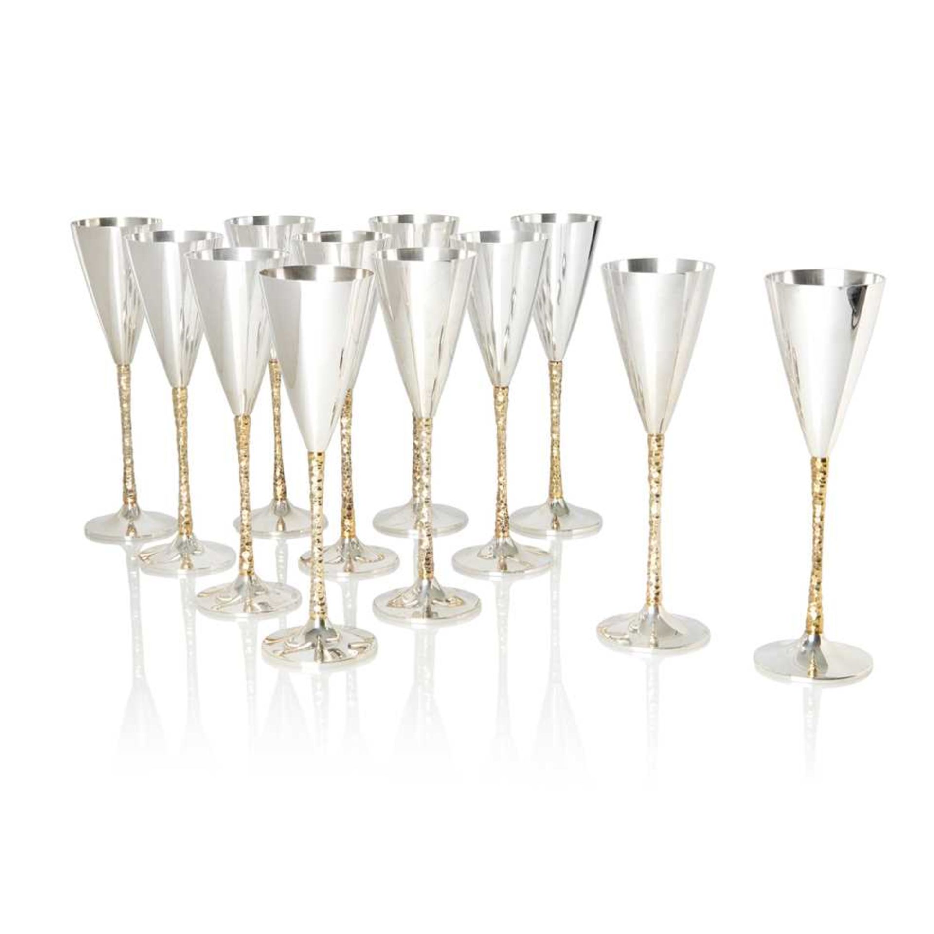 Stuart Devlin A.O. C.M.G. (Australian/British 1931-2018) Set of 12 Champagne Flutes, London 1977-198