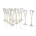 Stuart Devlin A.O. C.M.G. (Australian/British 1931-2018) Set of 12 Champagne Flutes, London 1977-198
