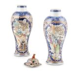 PAIR OF BLUE AND WHITE WITH FAMILLE ROSE VASES WITH ONE LID QING DYNASTY, QIANLONG PERIOD
