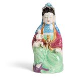 FAMILLE ROSE SEATED GUANYIN BESTOWING A SON QING DYNASTY, 19TH CENTURY