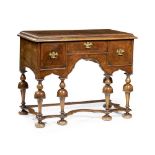 WILLIAM AND MARY WALNUT AND FEATHERBANDED LOWBOY LATE 17TH CENTURY AND LATER