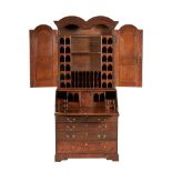 GEORGE I OAK DOUBLE DOME BUREAU BOOKCASE EARLY 18TH CENTURY