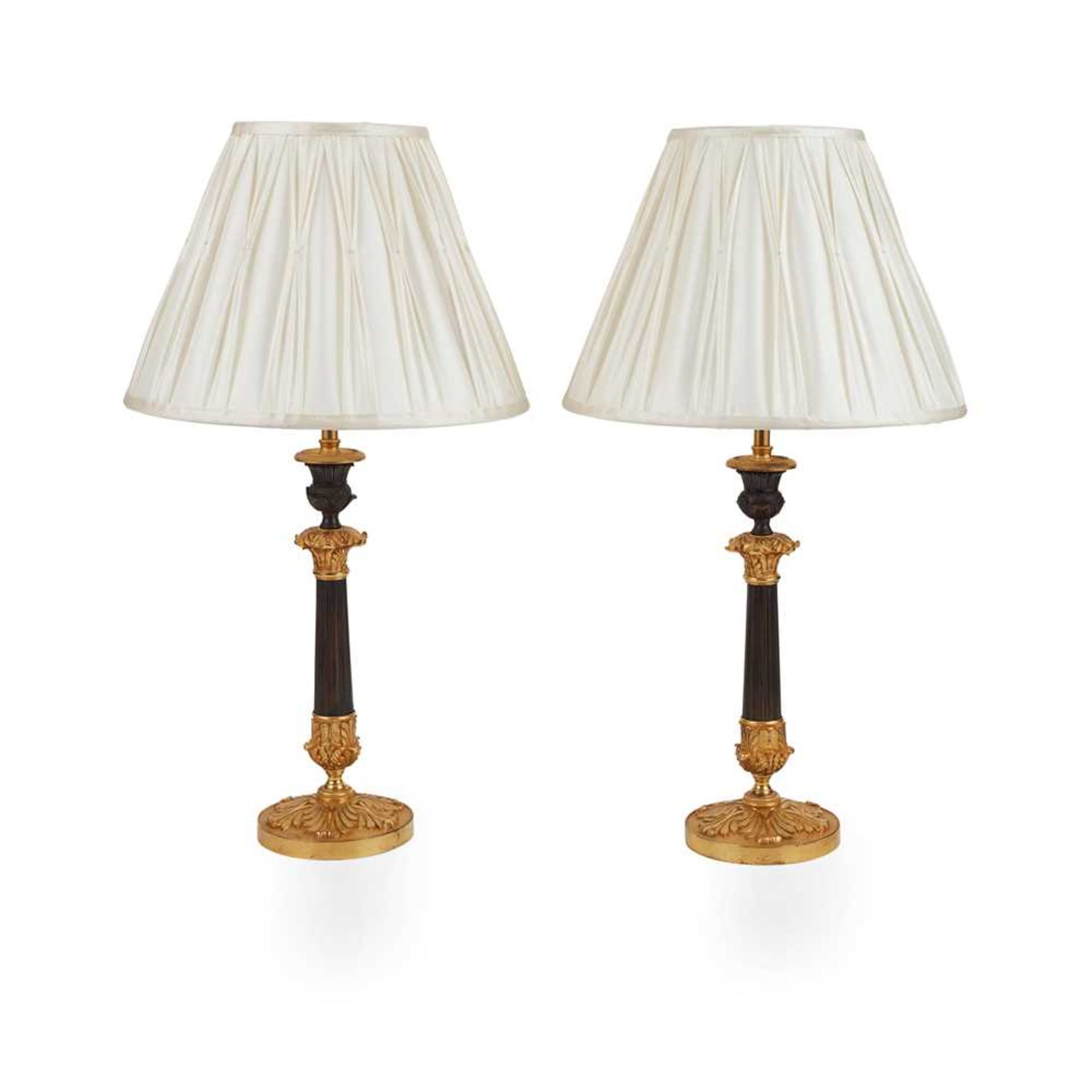 PAIR OF REGENCY PATINATED AND GILT BRONZE LAMPS EARLY 19TH CENTURY