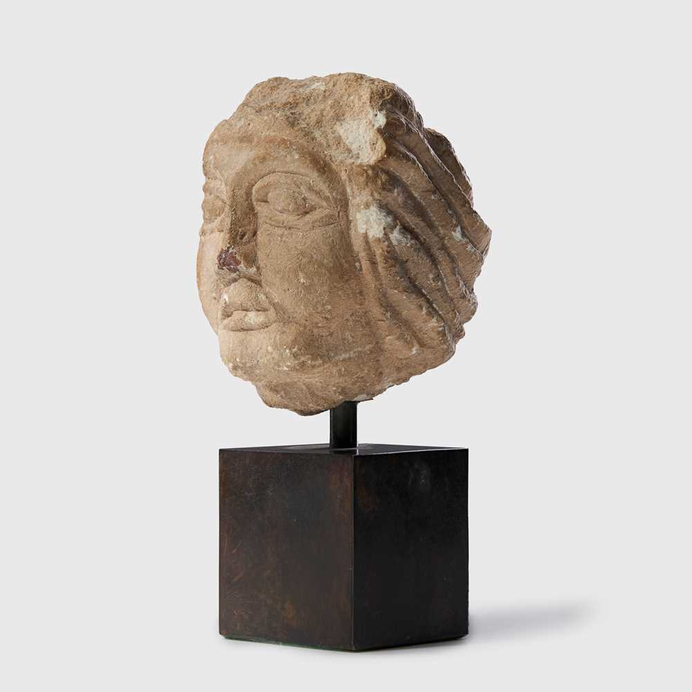 EASTERN ROMAN HEAD OF A DEITY NEAR EAST, 1ST CENTURY A.D.