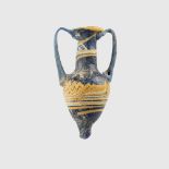PHEONICIAN GLASS AMPHORISKOS NEAR EAST OR EGYPT, 6TH - 5TH CENTURY B.C.
