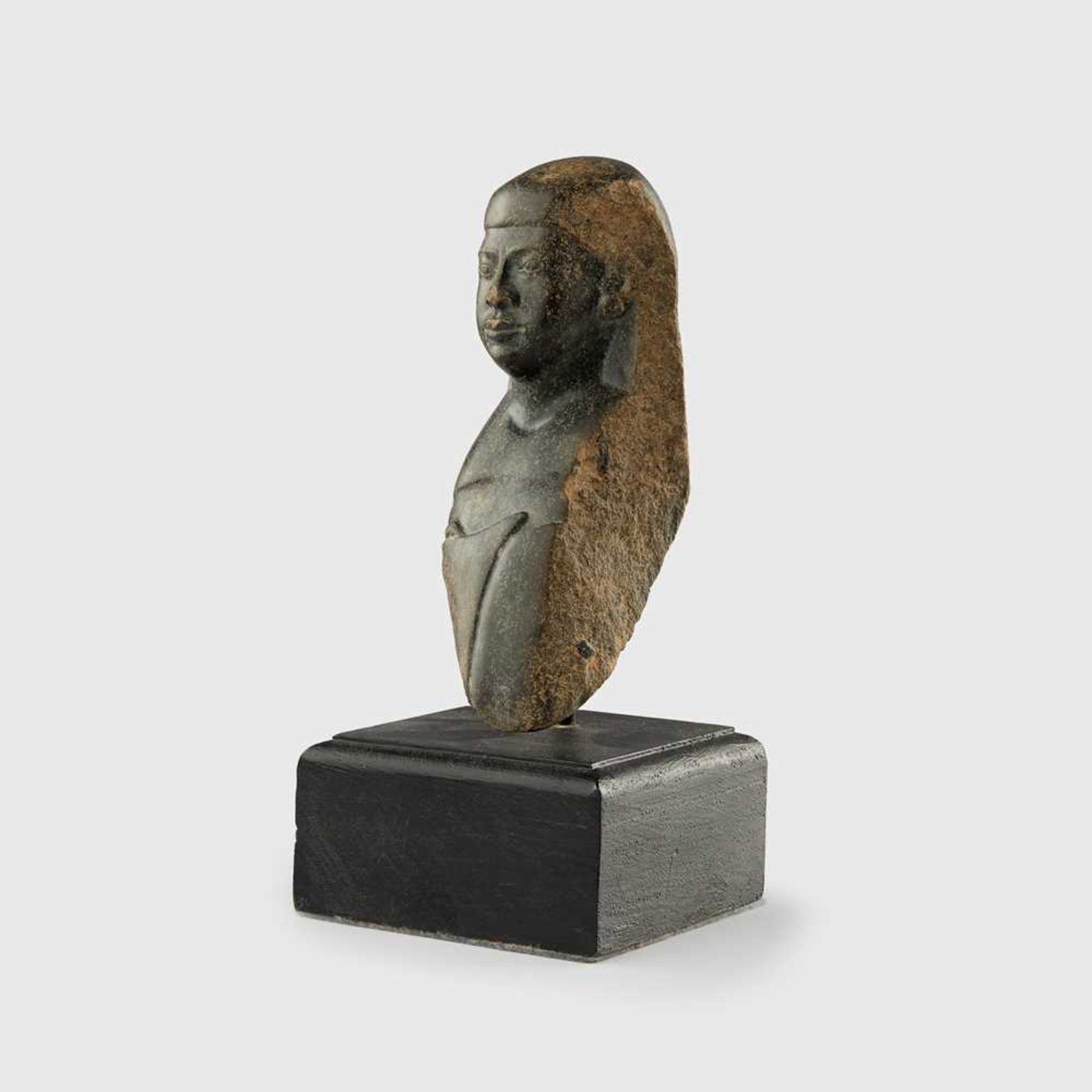 ANCIENT EGYPTIAN PORTRAIT BUST OF AN OFFICIAL EGYPT, MIDDLE KINGDOM, C. 2040 - 1782 B.C.