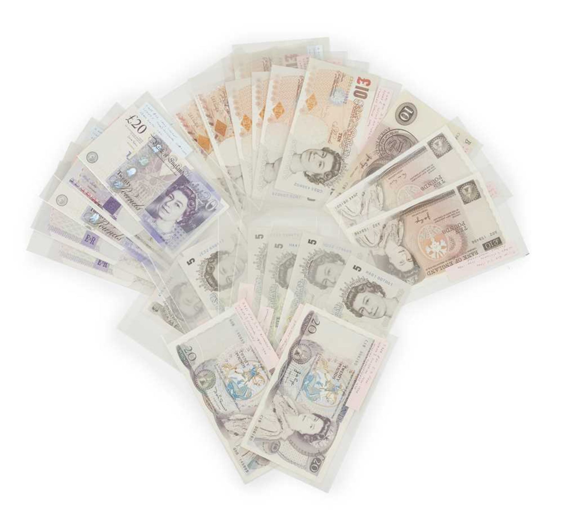 A group of Bank of England £5 and higher denomination banknotes