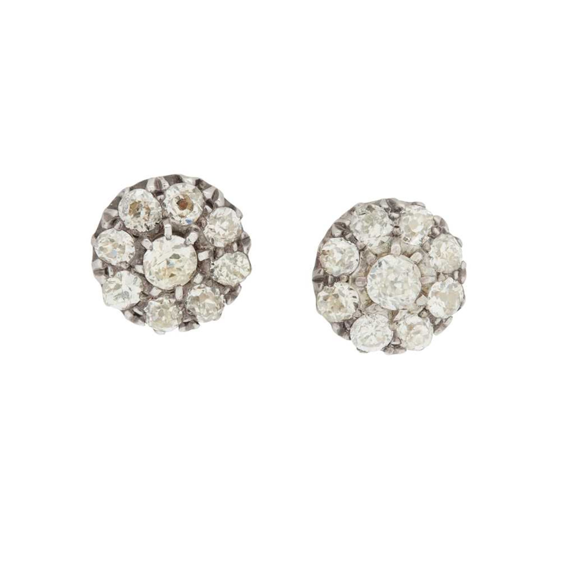 A pair of diamond cluster earrings