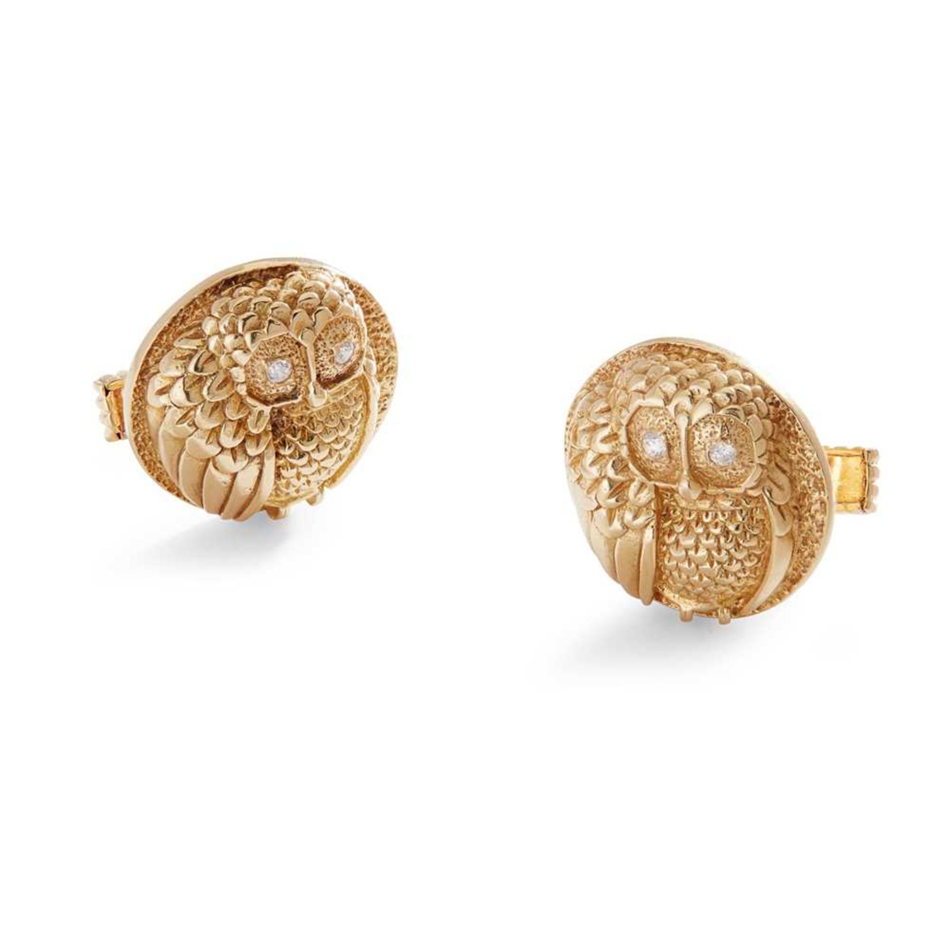 A pair of diamond owl cufflinks