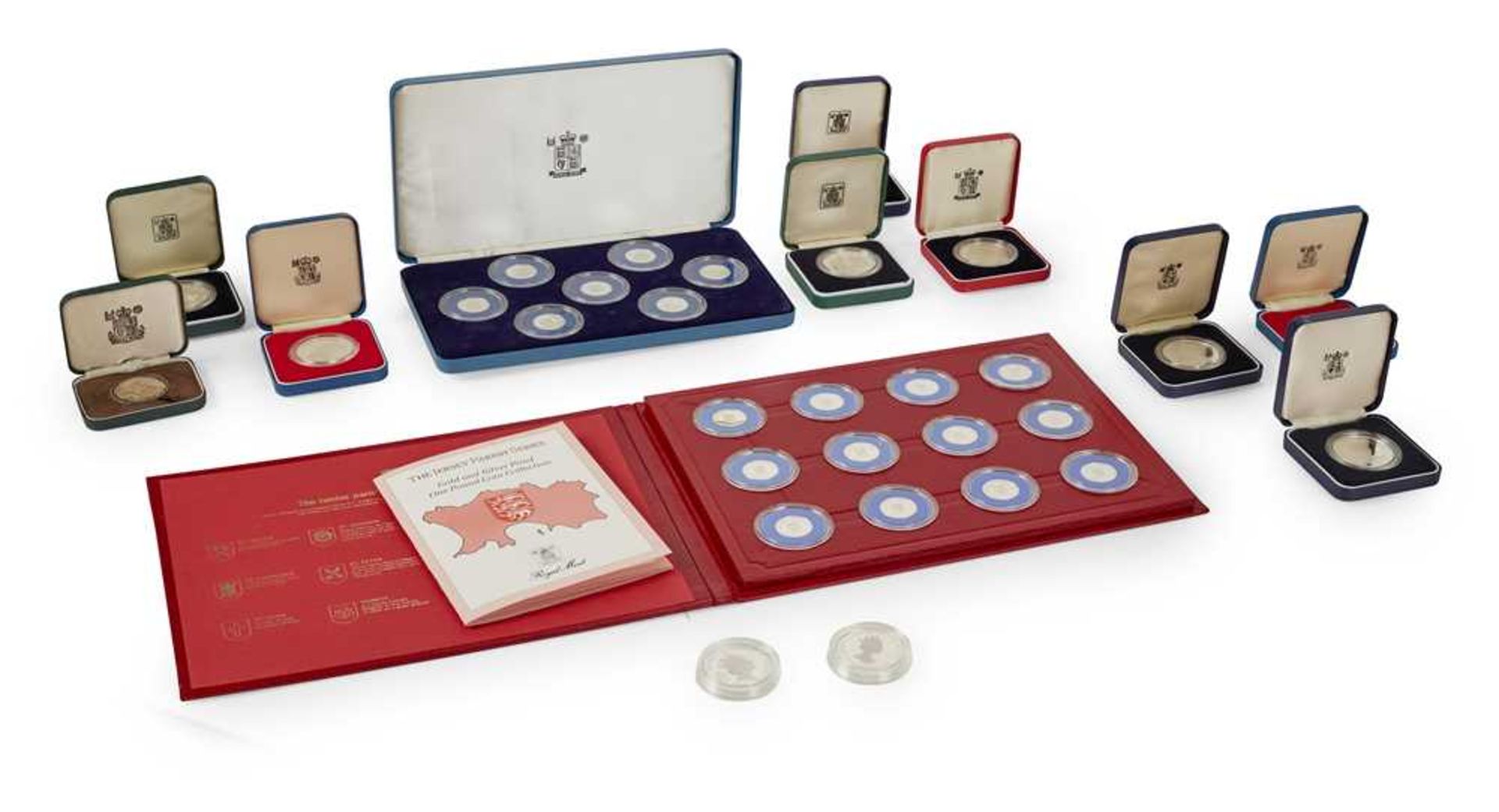 A collection of Jersey and Guernsey silver proof coins