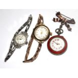 A ladies 9 carat gold 1930s wristwatch together with an enamel fob watch and an Ingersoll wristwatch