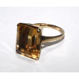 A 9 carat gold ring set with a large citrine