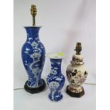 A Chinese prunus design baluster vase, 25.5 cm high, a similar vase form table lamp and a Masons