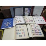 Four albums of Commonwealth and world postage stamps, two albums of Malta and Gibraltar stamps,