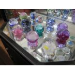 Twelve Caithness glass paperweights, including 'Royal Flush', 'Oriental Silk' and 'Rhythm &