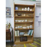 An oak open bookcase, with seven fixed graduated shelves, 100 cm wide, 199 cm high, 24 cm deep