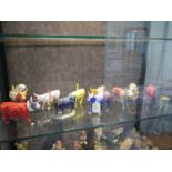 Ten 'Cowparade' figures, some resin