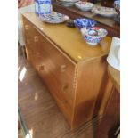 A light oak Stag Furniture chest of drawers, the three short drawers beside three long drawers on