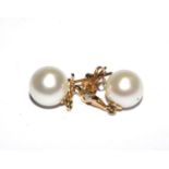 A pair of cultured pearl and diamond earrings