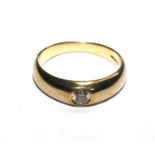 A Gentleman's 9 carat gold ring set with a single diamond