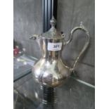 A silver plated water jug