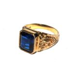 A gentleman's 9 carat gold ring set with blue stones