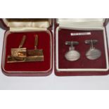 Two pairs of silver cufflinks