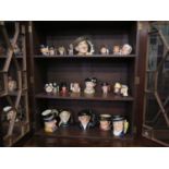 A collection of Royal Doulton character jugs, including Monty D6202, limited edition Micawber and Mr