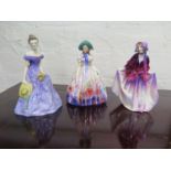 A Royal Doulton figure - Easter Day HN 2039, 19 cm high, another of Sweet Anne HN 1496 and a