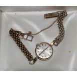 A gold Omega ladies watch, with guarantee (dated 1968) and case