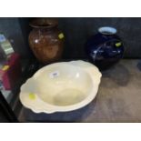 A Japanese cobalt blue vase, 17 cm high, a Clarice Cliff cream bowl and a Denby stoneware vase (3)