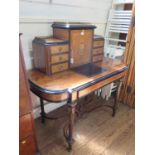A late Victorian French style satinwood and inlaid writing desk, the top with central urn inlaid