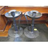 A pair of Goberg style bronzed metal candlesticks, in the Arts and Crafts style, 20 cm high