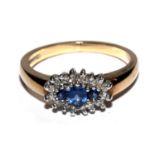 A sapphire and diamond cluster ring