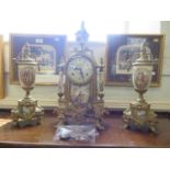 A French 19th century style clock garniture with porcelain panels, depicting Napoleonic figures, the