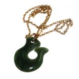 A green stone pendant on 9 carat gold neck chain