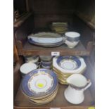 A Bradleys 'Glen' pattern part tea service, in blue and white chequer pattern with gilded foliage,