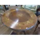 A Victorian walnut snap top centre table, the Italian marquetry inlaid top with floral decoration on