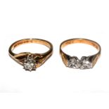 Two 9 carat gold rings set with white stones