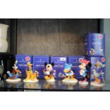 Six Royal Doulton Mickey Mouse Collection figures, in original boxes, celebrating 70 years of Mickey