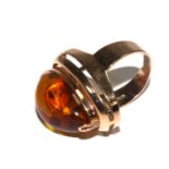 A continental gold and amber ring