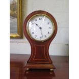 An Edwardian balloon shape table clock timepiece, the enamel dial within a mahogany and boxwood