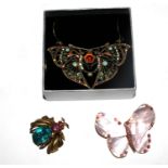 A pendant necklace in the form of a gem set butterfly together with two insect brooches