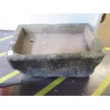 A stone rectangular trough, 76 x 49 cm, and another similar trough (2)