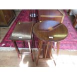 An Edwardian inlaid mahogany window table, the circular top with patera inlay on square legs